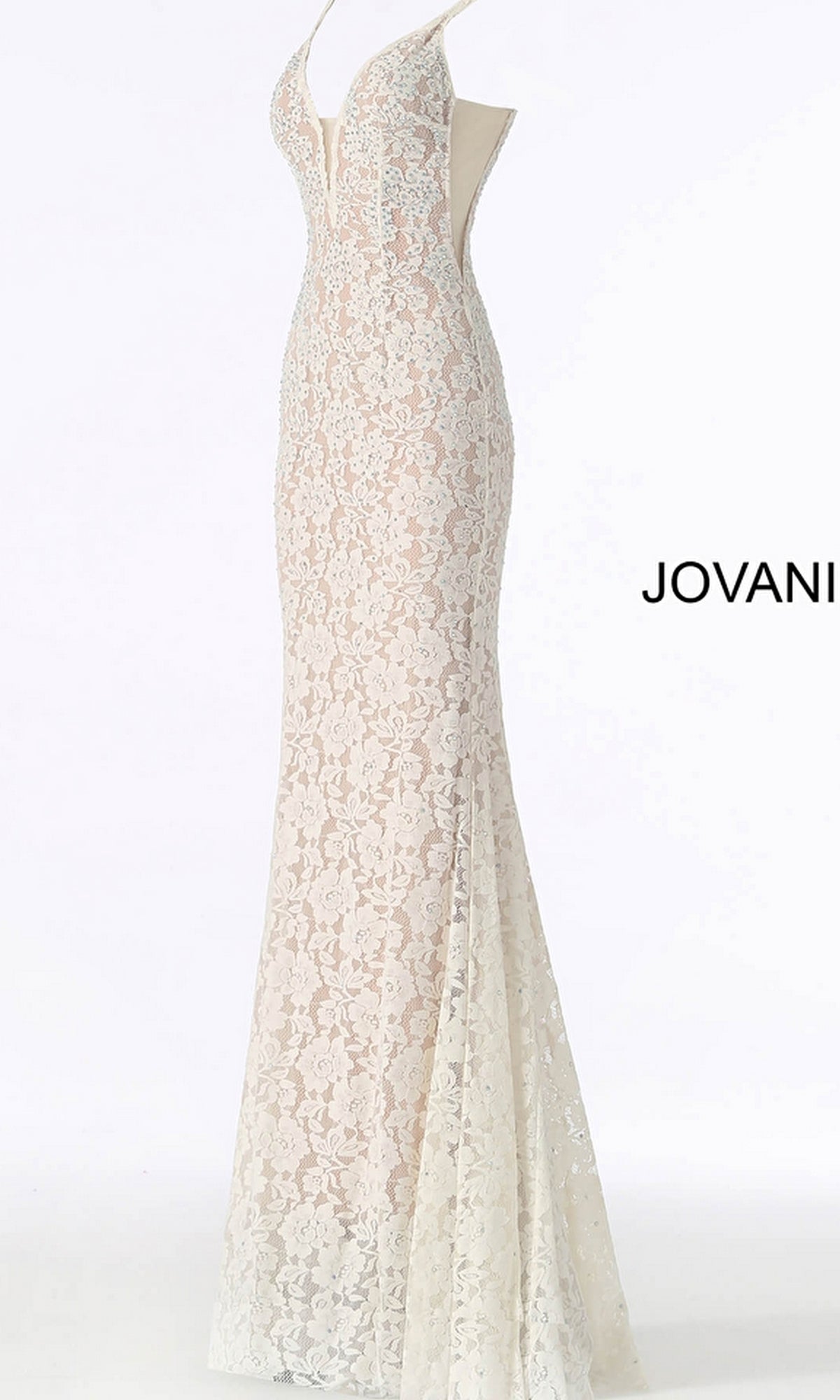 The Illusion-Sides Long Lace Prom Dress Jovani 48994 is a sleeveless, floor-length white lace gown with a deep V-neckline and fitted silhouette, displayed on a mannequin.